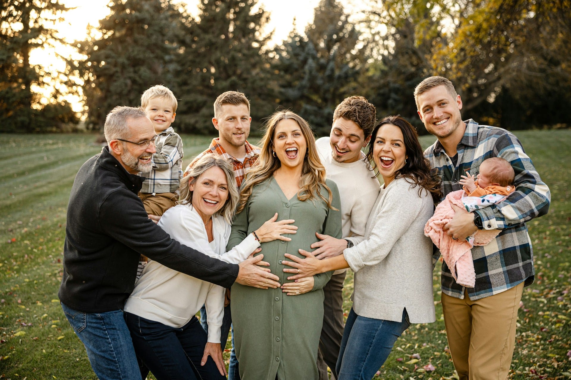 Family together outdoors, representing a family-first approach to financial planning.